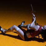 Scena dello spettacolo The brotherhood: Carolina Bianchi a terra trafitta da una lancia